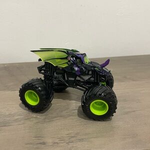 Vibrant Green and Purple Monster Jam Truck Toy
